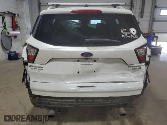 2017 Ford Escape Titanium с VIN 1FMCU9J96HUC05437, выставлен на аукционе Copart как лот 80256605 с пробегом 175 408 миль миль и Списание • Salvage title. История ставок и продаж доступна на DreamBid. Изображение 6.
