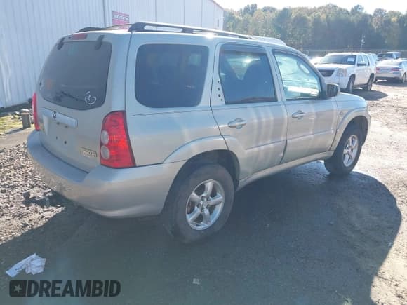 ✅ 2005 Mazda Tribute S • VIN: 4F2YZ04195KM43786 • Lot: 43575681. Wystawiony na IAAI z przebiegiem 212 773 mil. Bezpłatny archiwum sprzedaży aukcyjnych z USA i szczegółowy raport historii pojazdu na DreamBid. Zdjęcie 4.
