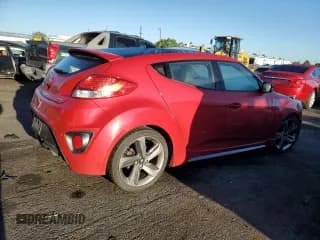 ✅ 2015 Hyundai Veloster Turbo • VIN: KMHTC6AE0FU229681 • Lot: 72837774. Listed on Copart with 90,372 mi. Free auction sales archive from the USA and detailed vehicle history report at DreamBid. Image 3.