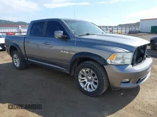 ✅ 2009 Dodge 1500 Laramie • VIN: 1D3HV13T79S824506 • Lot: 42373519. Wystawiony na IAAI z przebiegiem 305 976 mil. Bezpłatny archiwum sprzedaży aukcyjnych z USA i szczegółowy raport historii pojazdu na DreamBid. Zdjęcie 1.