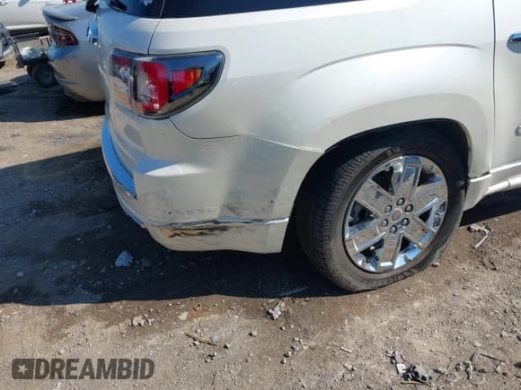 ✅ 2013 GMC Acadia Denali • VIN: 1GKKRTKD4DJ209391 • Lot: 43129576. Listed on IAAI with 129,017 mi. Free auction sales archive from the USA and detailed vehicle history report at DreamBid. Image 12.