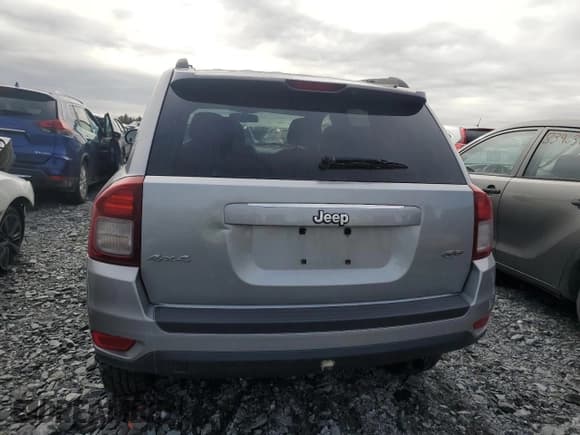 ✅ 2014 Jeep Compass North • VIN: 1C4NJDAB2ED748243 • Lot: 71584815. Wystawiony na Copart z przebiegiem 105 296 mil. Bezpłatny archiwum sprzedaży aukcyjnych z USA i szczegółowy raport historii pojazdu na DreamBid. Zdjęcie 6.