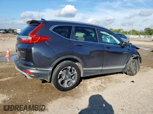 ✅ 2017 Honda CR-V Touring • VIN: 2HKRW2H99HH646639 • Лот: 81446515. Опубликован ранее на Copart с пробегом 124 900 миль. Бесплатный доступ к архиву аукционных продаж из США и подробный отчёт об истории автомобиля на DreamBid. Изображение 3.