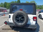 ✅ 2022 Jeep Wrangler Unlimited Sport S • VIN: 1C4HJXDG8NW259579 • Lot: 42974393. Wystawiony na IAAI z przebiegiem 55 553 mil. Bezpłatny archiwum sprzedaży aukcyjnych z USA i szczegółowy raport historii pojazdu na DreamBid. Zdjęcie 16.