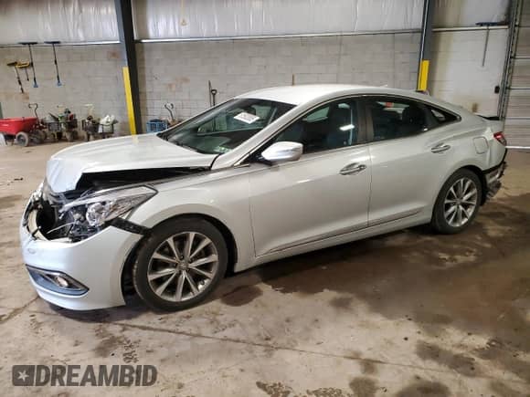 2015 Hyundai Azera z VIN KMHFG4JGXFA483312, wystawiony jako Copart lot #51592085 z przebiegiem 92 219 mil mil oraz Szkoda całkowita • Salvage title. Historia ofert i sprzedaży dostępna na DreamBid. Obrazek 1.