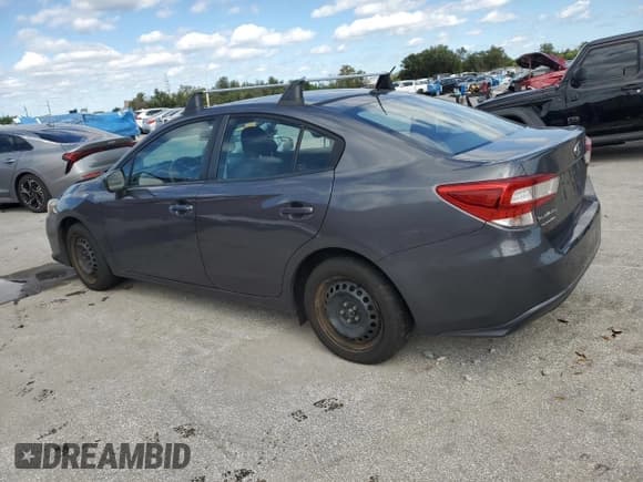 ✅ 2020 Subaru Impreza • VIN: 4S3GKAB69L3613057 • Lot: 90908865. Listed on Copart with 76,774 mi. Free auction sales archive from the USA and detailed vehicle history report at DreamBid. Image 2.