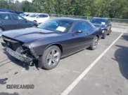 ✅ 2013 Dodge Challenger SXT • VIN: 2C3CDYAG0DH684162 • Lot: 43399757. Listed on IAAI with 113,941 mi. Free auction sales archive from the USA and detailed vehicle history report at DreamBid. Image 2.