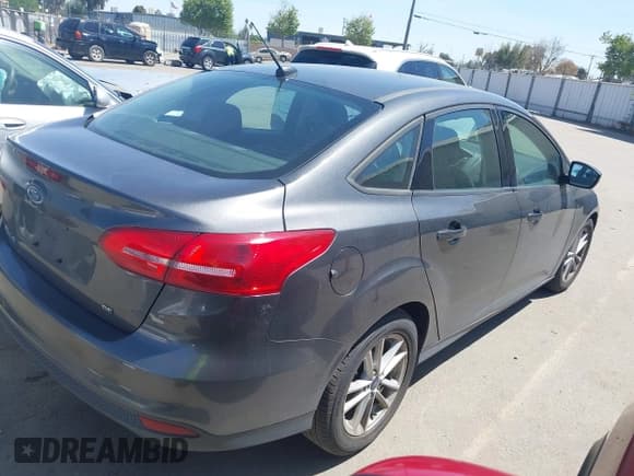 ✅ 2017 Ford Focus SE • VIN: 1FADP3F26HL308880 • Lot: 41991909. Listed on IAAI with 103,403 mi. Free auction sales archive from the USA and detailed vehicle history report at DreamBid. Image 4.