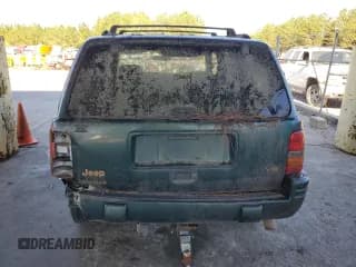 ✅ 1998 Jeep Grand Cherokee Limited • VIN: 1J4GZ78Y8WC261353 • Лот: 76605944. Опубликован ранее на Copart с пробегом 156 883 миль. Бесплатный доступ к архиву аукционных продаж из США и подробный отчёт об истории автомобиля на DreamBid. Изображение 6.