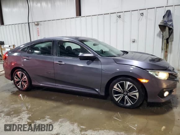 ✅ 2017 Honda Civic EX-T • VIN: 2HGFC1F30HH655390 • Лот: 92200135. Опубликован ранее на Copart с пробегом 128 238 миль. Бесплатный доступ к архиву аукционных продаж из США и подробный отчёт об истории автомобиля на DreamBid. Изображение 4.