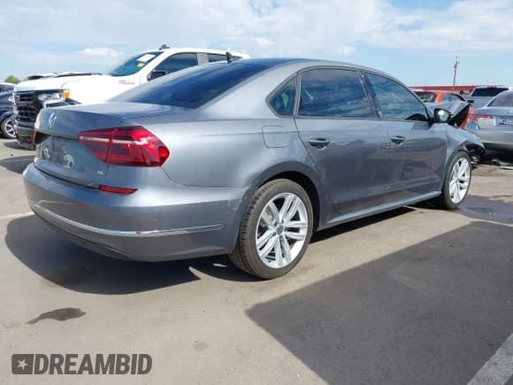 ✅ 2019 Volkswagen Passat Wolfsburg Edition • VIN: 1VWLA7A32KC004903 • Lot: 42666255. Listed on IAAI with 95,735 mi. Free auction sales archive from the USA and detailed vehicle history report at DreamBid. Image 4.