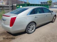 ✅ 2014 Cadillac XTS Luxury • VIN: 2G61N5S38E9265579 • Lot: 42893937. Listed on IAAI with 118,609 mi. Free auction sales archive from the USA and detailed vehicle history report at DreamBid. Image 4.