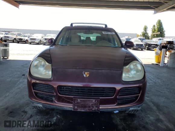 ✅ 2004 Porsche Cayenne • VIN: WP1AA29P74LA24053 • Лот: 69497125. Опубликован ранее на Copart с пробегом 248 021 миль. Бесплатный доступ к архиву аукционных продаж из США и подробный отчёт об истории автомобиля на DreamBid. Изображение 5.