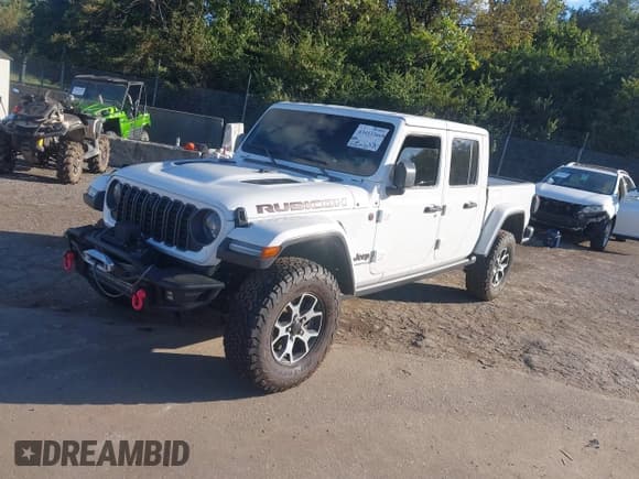 ✅ 2024 Jeep Gladiator Rubicon • VIN: 1C6JJTBG8RL105059 • Лот: 43413366. Опубликован ранее на IAAI с пробегом Не указан. Бесплатный доступ к архиву аукционных продаж из США и подробный отчёт об истории автомобиля на DreamBid. Изображение 2.