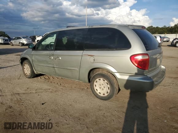 ✅ 2003 Chrysler Town & Country LX • VIN: 2C4GP44363R114973 • Lot: 82255625. Listed on Copart with 300,083 mi. Free auction sales archive from the USA and detailed vehicle history report at DreamBid. Image 2.