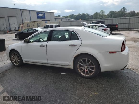 ✅ 2010 Chevrolet Malibu LTZ • VIN: 1G1ZE5E07AF324293 • Lot: 71934624. Listed on Copart with 184,894 mi. Free auction sales archive from the USA and detailed vehicle history report at DreamBid. Image 2.