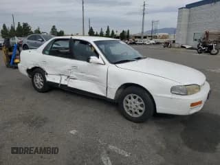 ✅ 1995 Toyota Camry • VIN: 4T1SK13E5SU870530 • Lot: 70051695. Listed on Copart with 243,795 mi. Free auction sales archive from the USA and detailed vehicle history report at DreamBid. Image 4.