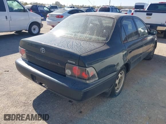 ✅ 1996 Toyota Corolla • VIN: 1NXBA02E8TZ493966 • Lot: 43775910. Listed on IAAI with 274,782 mi. Free auction sales archive from the USA and detailed vehicle history report at DreamBid. Image 4.