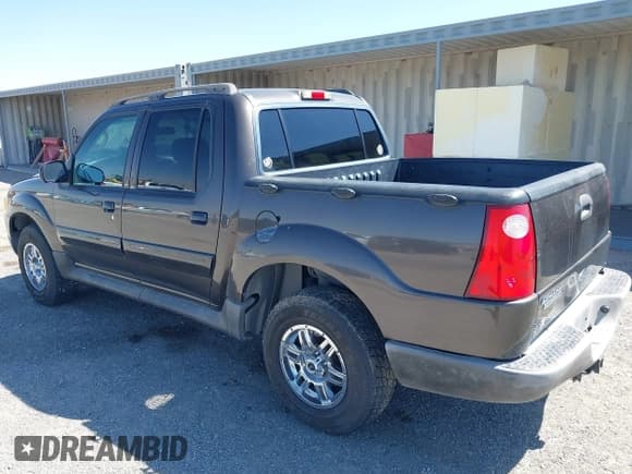 ✅ 2005 Ford Explorer Sport Trac XLS • VIN: 1FMZU77K25UB06618 • Lot: 43205410. Wystawiony na IAAI z przebiegiem 150 856 mil. Bezpłatny archiwum sprzedaży aukcyjnych z USA i szczegółowy raport historii pojazdu na DreamBid. Zdjęcie 3.