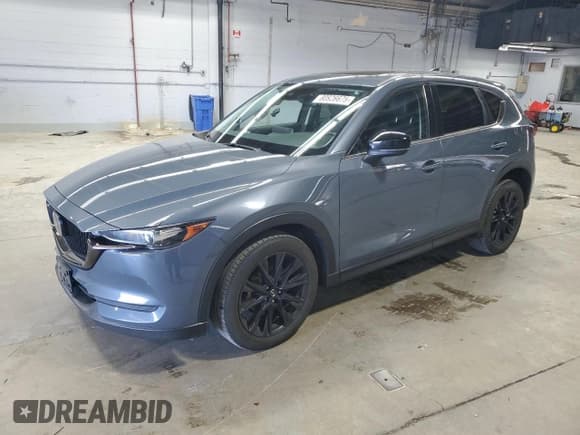 ✅ 2021 Mazda CX-5 Carbon Edition • VIN: JM3KFBCM9M0432858 • Lot: 80926675. Listed on Copart with 44,953 mi. Free auction sales archive from the USA and detailed vehicle history report at DreamBid. Image 1.