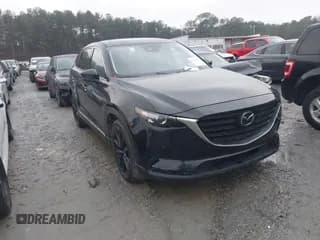 ✅ 2023 Mazda CX-9 Touring Plus • VIN: JM3TCBAY2P0657310 • Lot: 43848567. Wystawiony na IAAI z przebiegiem 80 730 mil. Bezpłatny archiwum sprzedaży aukcyjnych z USA i szczegółowy raport historii pojazdu na DreamBid. Zdjęcie 1.