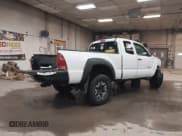 ✅ 2015 Toyota Tacoma • VIN: 5TFUX4EN9FX036973 • Lot: 41600331. Listed on IAAI with 150,343 mi. Free auction sales archive from the USA and detailed vehicle history report at DreamBid. Image 4.