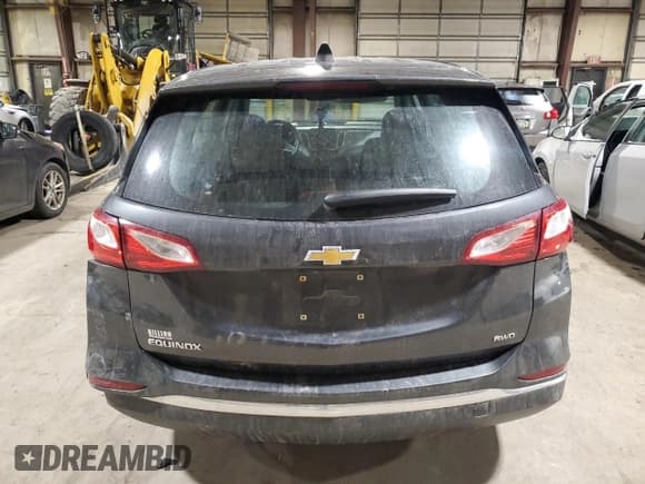 ✅ 2018 Chevrolet Equinox LS • VIN: 2GNAXREV4J6197117 • Lot: 85804864. Wystawiony na Copart z przebiegiem 55 865 mil. Bezpłatny archiwum sprzedaży aukcyjnych z USA i szczegółowy raport historii pojazdu na DreamBid. Zdjęcie 6.