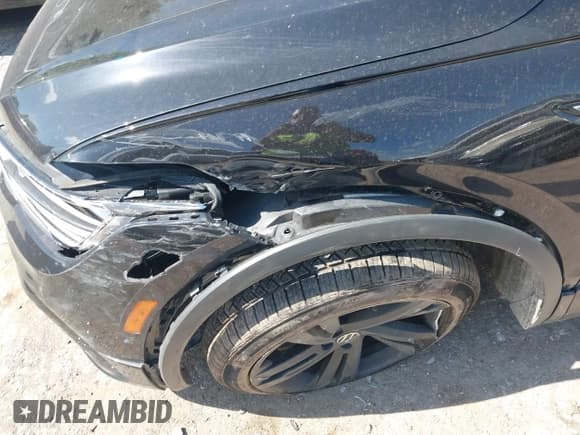 ✅ 2023 Volkswagen Tiguan SE R-Line Black • VIN: 3VVCB7AX3PM116622 • Лот: 42564070. Опубликован ранее на IAAI с пробегом 60 539 миль. Бесплатный доступ к архиву аукционных продаж из США и подробный отчёт об истории автомобиля на DreamBid. Изображение 6.