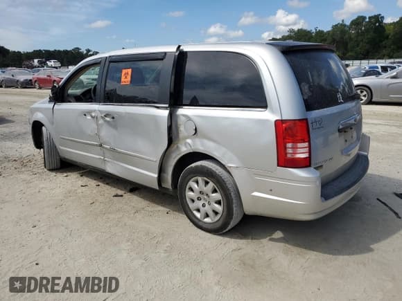 ✅ 2009 Chrysler Town & Country LX • VIN: 2A8HR44E79R606266 • Lot: 81078695. Listed on Copart with 189,411 mi. Free auction sales archive from the USA and detailed vehicle history report at DreamBid. Image 2.