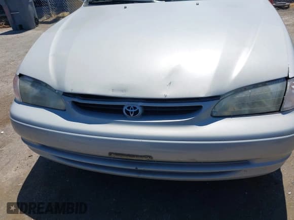 ✅ 2000 Toyota Corolla VE • VIN: 1NXBR12E5YZ407051 • Lot: 42897329. Listed on IAAI with 133,128 mi. Free auction sales archive from the USA and detailed vehicle history report at DreamBid. Image 6.