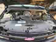 2002 Chevrolet Suburban Z71 z VIN 3GNFK16Z72G349789, wystawiony jako Copart lot #79714354 z przebiegiem 290 525 mil mil oraz Szkoda całkowita • Salvage title. Historia ofert i sprzedaży dostępna na DreamBid. Obrazek 14.