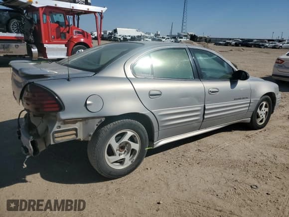 ✅ 2000 Pontiac Grand Am SE1 • VIN: 1G2NF52E8YM883123 • Lot: 74504254. Listed on Copart with 196,077 mi. Free auction sales archive from the USA and detailed vehicle history report at DreamBid. Image 3.
