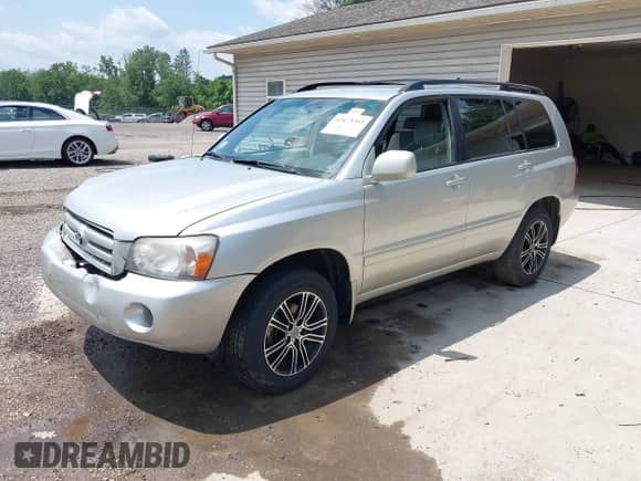 2006 Toyota Highlander z VIN JTEGD21AX60139594, wystawiony jako IAAI lot #42473393 z przebiegiem 210 409 mil mil oraz . Historia ofert i sprzedaży dostępna na DreamBid. Obrazek 2.