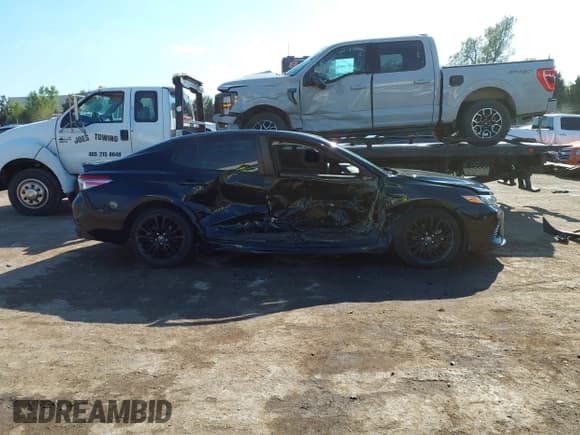 ✅ 2019 Toyota Camry SE • VIN: 4T1B11HK9KU239538 • Лот: 43450438. Опубликован ранее на IAAI с пробегом 104 773 миль. Бесплатный доступ к архиву аукционных продаж из США и подробный отчёт об истории автомобиля на DreamBid. Изображение 14.