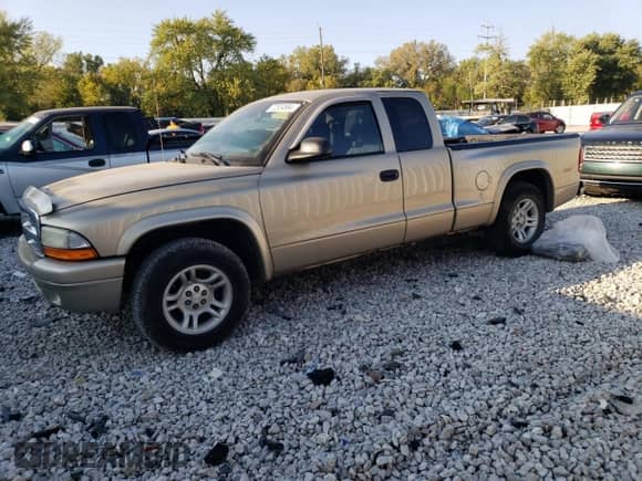 2004 Dodge Dakota with VIN 1D7GL12K14S545148, listed as a Copart auction lot 72534984 with 97,050 mi miles and Salvage title. Bid and sale history available at DreamBid. Image 1.