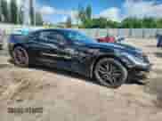 2014 Chevrolet Corvette Z51 1LT с VIN 1G1YG2D73E5113977, выставлен на аукционе Copart как лот 71169915 с пробегом 62 369 миль миль и Списание • Salvage title. История ставок и продаж доступна на DreamBid. Изображение 4.