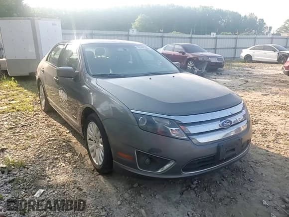 ✅ 2011 Ford Fusion Hybrid • VIN: 3FADP0L36BR264626 • Lot: 53340265. Listed on Copart with 174,902 mi. Free auction sales archive from the USA and detailed vehicle history report at DreamBid. Image 13.