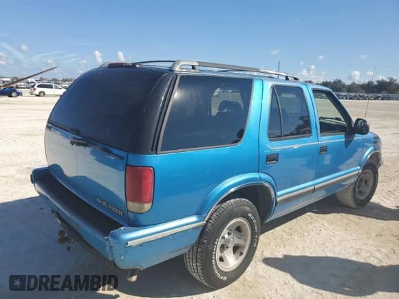 1995 Chevrolet Blazer с VIN 1GNCS13W7SK206038, выставлен на аукционе Copart как лот 76593134 с пробегом 135 008 миль миль и Списание • Salvage title. История ставок и продаж доступна на DreamBid. Изображение 3.