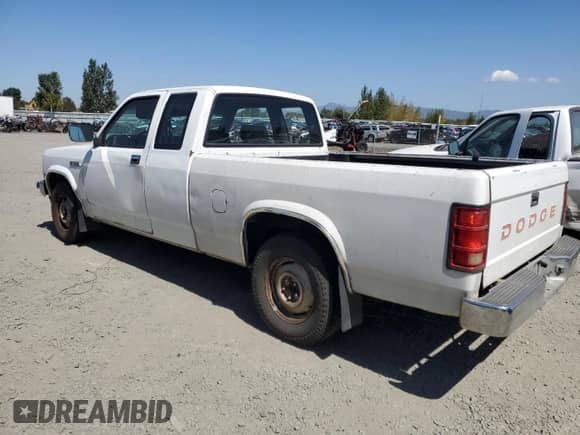 1990 Dodge Dakota with VIN 1B7GL23XXLS708226, listed as a Copart auction lot 69859125 with 372,216 mi miles and Salvage title. Bid and sale history available at DreamBid. Image 2.