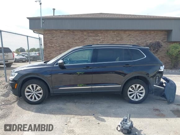 ✅ 2018 Volkswagen Tiguan SEL • VIN: 3VV2B7AX0JM084778 • Лот: 43200447. Опубликован ранее на IAAI с пробегом 77 889 миль. Бесплатный доступ к архиву аукционных продаж из США и подробный отчёт об истории автомобиля на DreamBid. Изображение 14.