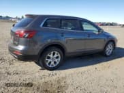 ✅ 2015 Mazda CX-9 Touring • VIN: JM3TB3CA5F0453981 • Lot: 68707165. Wystawiony na Copart z przebiegiem 159 430 mil. Bezpłatny archiwum sprzedaży aukcyjnych z USA i szczegółowy raport historii pojazdu na DreamBid. Zdjęcie 3.