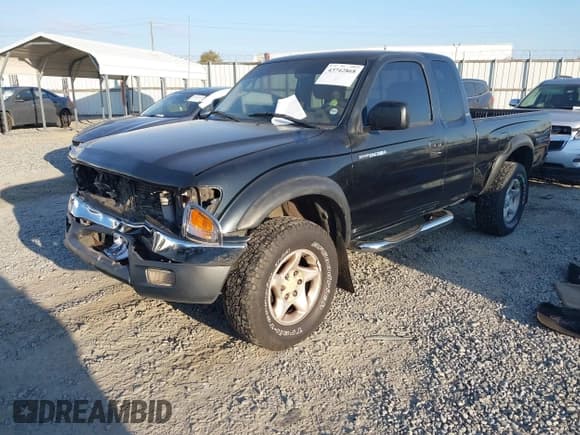 ✅ 2003 Toyota Tacoma PreRunner • VIN: 5TESN92N53Z284771 • Lot: 43742868. Listed on IAAI with 445,263 mi. Free auction sales archive from the USA and detailed vehicle history report at DreamBid. Image 2.