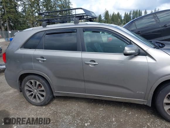 ✅ 2015 Kia Sorento SX Limited • VIN: 5XYKWDA7XFG591922 • Лот: 41947810. Опубликован ранее на IAAI с пробегом 127 167 миль. Бесплатный доступ к архиву аукционных продаж из США и подробный отчёт об истории автомобиля на DreamBid. Изображение 14.