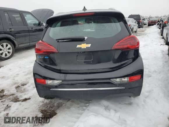 2017 Chevrolet Bolt EV Premier z VIN 1G1FX6S02H4171593, wystawiony jako Copart lot #38327014 z przebiegiem 85 598 mil mil oraz . Historia ofert i sprzedaży dostępna na DreamBid. Obrazek 6.