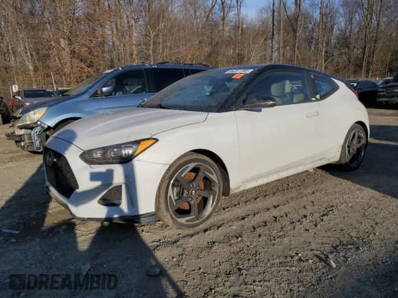 2019 Hyundai Veloster Turbo R-Spec z VIN KMHTH6AB7KU013196, wystawiony jako Copart lot #46281785 z przebiegiem 117 555 mil mil oraz Szkoda całkowita • Salvage title. Historia ofert i sprzedaży dostępna na DreamBid. Obrazek 1.