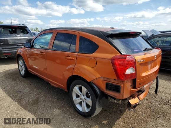 2011 Dodge Caliber Mainstreet z VIN 1B3CB3HAXBD108046, wystawiony jako Copart lot #67521764 z przebiegiem 152 280 mil mil oraz Szkoda całkowita • Salvage title. Historia ofert i sprzedaży dostępna na DreamBid. Obrazek 2.