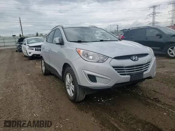 2011 Hyundai Tucson GLS z VIN KM8JU3AC7BU284852, wystawiony jako Copart lot #69496824 z przebiegiem 155 411 mil mil oraz Szkoda całkowita • Salvage title. Historia ofert i sprzedaży dostępna na DreamBid. Obrazek 10.