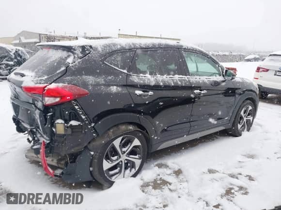 2018 Hyundai Tucson Limited with VIN KM8J33A25JU719215, listed as a IAAI auction lot 41304125 with 118,429 mi miles and . Bid and sale history available at DreamBid. Image 4.