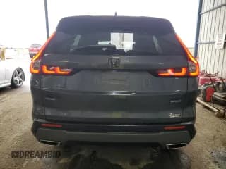 ✅ 2023 Honda CR-V Sport Touring • VIN: 7FARS6H98PE010766 • Лот: 83843015. Опубликован ранее на Copart с пробегом 70 044 миль. Бесплатный доступ к архиву аукционных продаж из США и подробный отчёт об истории автомобиля на DreamBid. Изображение 6.