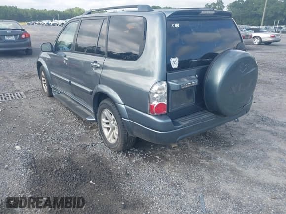 ✅ 2006 Suzuki XL7 • VIN: JS3TY92V964100782 • Lot: 42678396. Listed on IAAI with 218,621 mi. Free auction sales archive from the USA and detailed vehicle history report at DreamBid. Image 3.